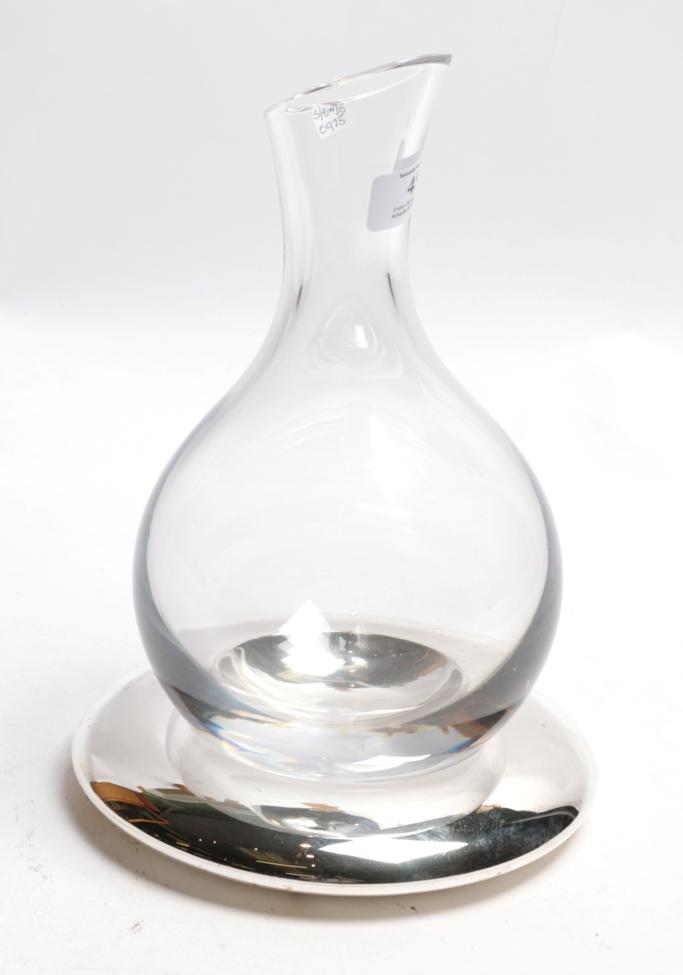 Lot 45 - A glass carafe with Elizabeth II silver base, the base by Francis Howard Ltd., London, 2008,...