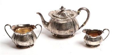 Lot 54 - A three piece silver tea service, by Elkington & Co, Sheffield, 1904, each piece fluted and...
