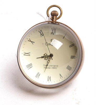 Lot 60 - A bullseye desk clock with faux Omega dial