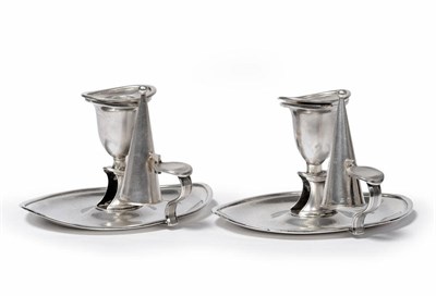 Lot 529 - A Pair of George III Chambersticks, James Ellis & Co, Sheffield 1795, the plain oval bases with...