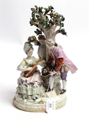 Lot 69 - A Meissen porcelain figure group, late 19th century, as a lady sitting playing the guitar, a...