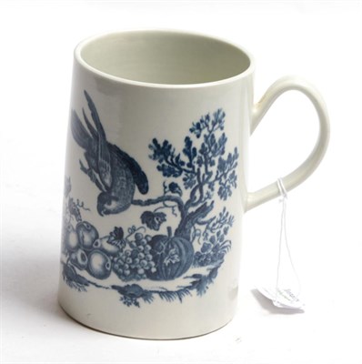 Lot 76 - A Worcester porcelain large mug, circa 1775, printed in underglaze blue with The Parrot Pecking...