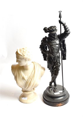 Lot 94 - A spelter figure of a guard in 16th century costume together with a reconstituted marble bust...