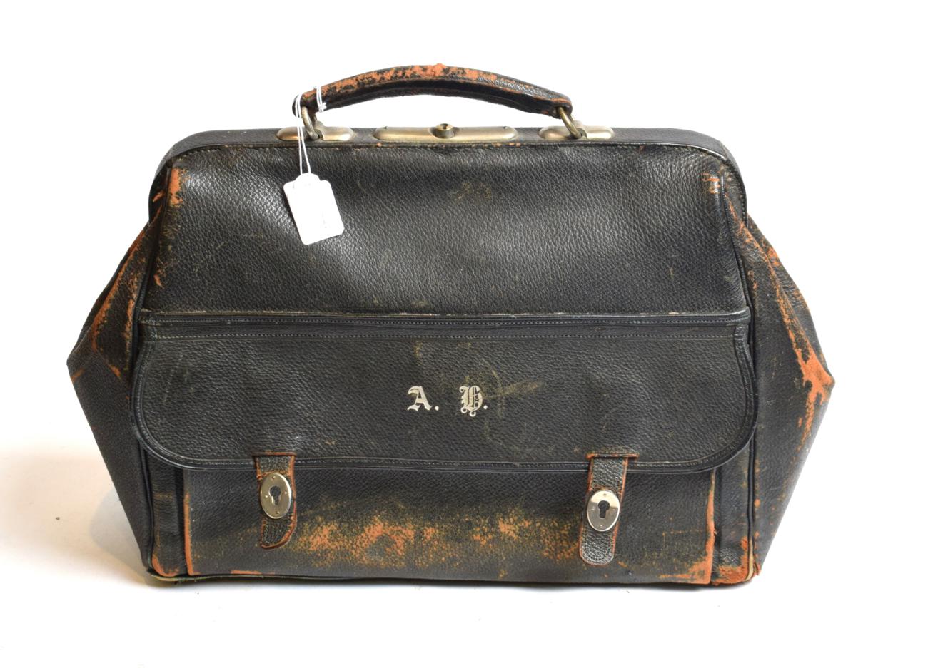 Lot 99 - A Victorian gentleman's leather Gladstone bag, fitted inside with four silver-mounted...