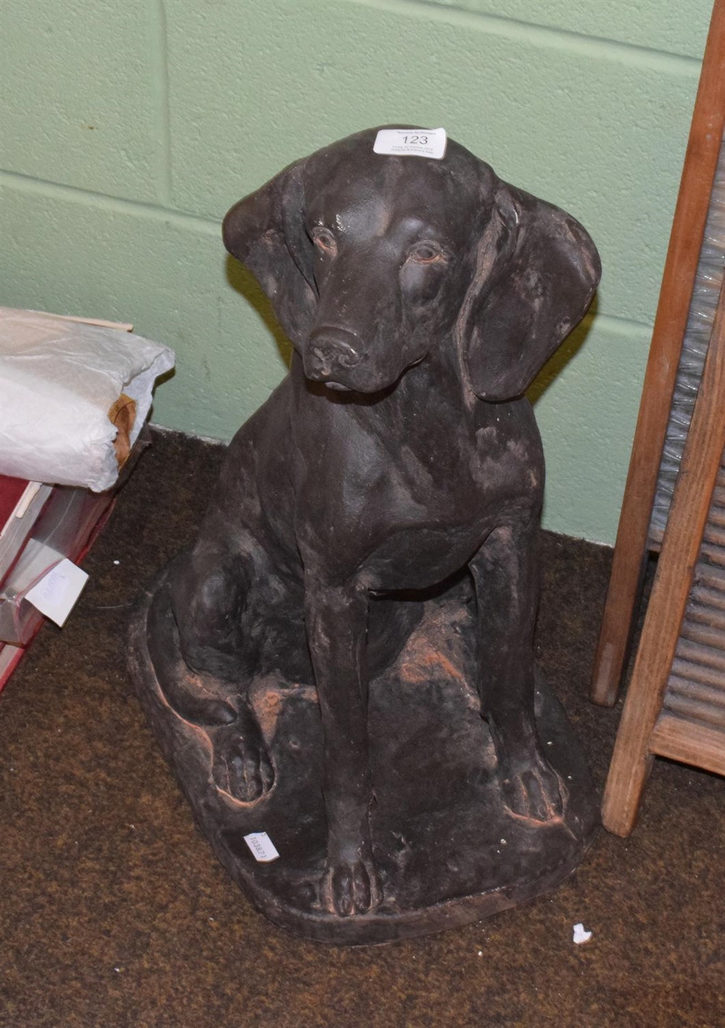 Lot 123 - A composition model of a seated dog