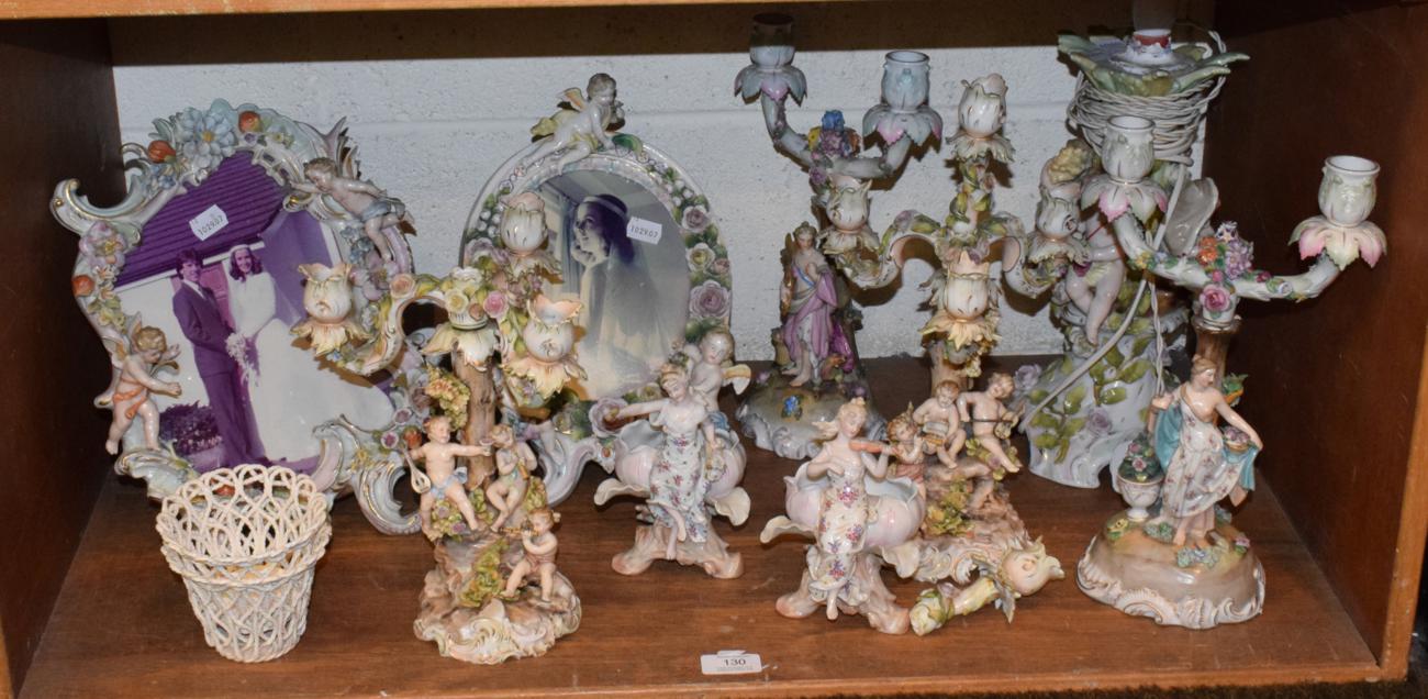 Lot 130 - Quantity of floral encrusted and figural Dresden porcelain, including twin light candelabra,...
