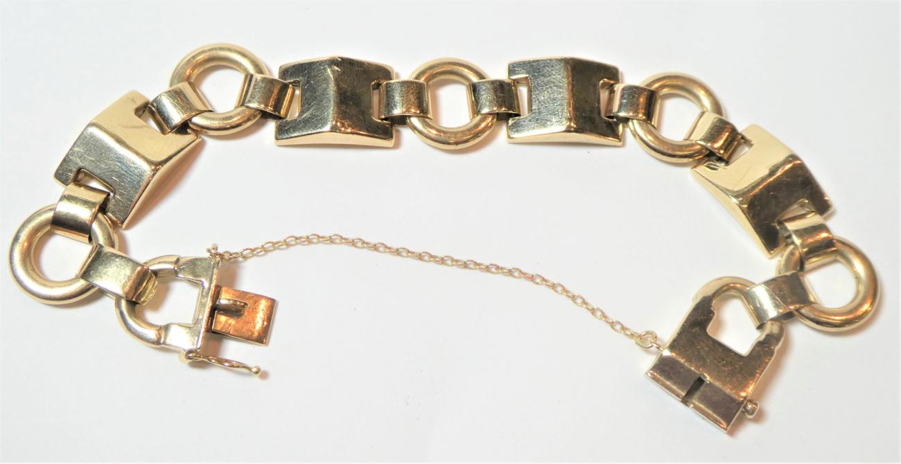 Lot 149 - A fancy link bracelet, stamped '9CT', length 19.5cm