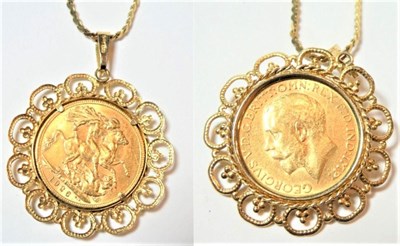 Lot 151 - A 1926 sovereign loose mounted as a pendant on a 9 carat gold chain, pendant length 4cm, chain...