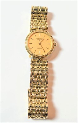 Lot 159 - A lady's plated wristwatch, signed Longines, circa 1988, quartz movement, champagne coloured...