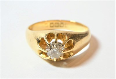 Lot 163 - An 18 carat gold diamond solitaire ring, an old cut diamond in a yellow claw setting to a plain...