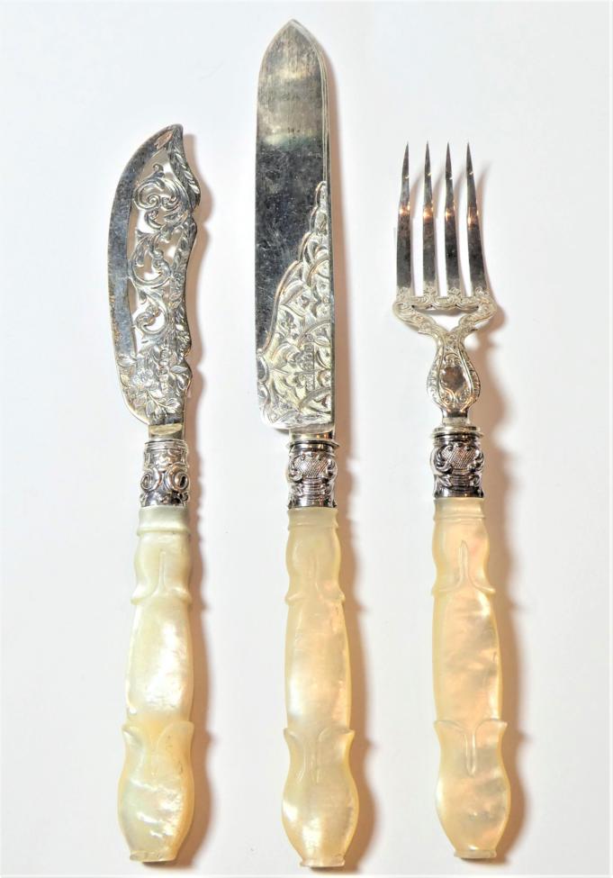 Lot 168 - Three Victorian silver serving pieces with mother-of-pearl handles, by George Unite,...