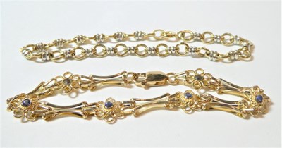 Lot 183 - A 9 carat gold sapphire set fancy link bracelet, length 18.5cm;and a 9 carat two colour gold...