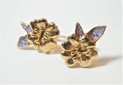 Lot 195 - A pair of 9 carat gold enamel earrings, floral studs with enamelled leaves, with post fittings