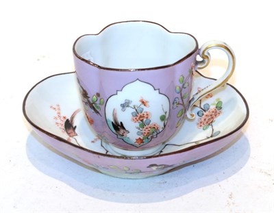Lot 200 - A Meissen cup and saucer, hand painted in the Chinese famille rose style
