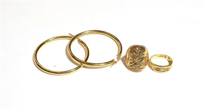 Lot 226 - A pair of hoop earrings with a clasps stamped '375'; a sovereign type ring, shank hallmarked...