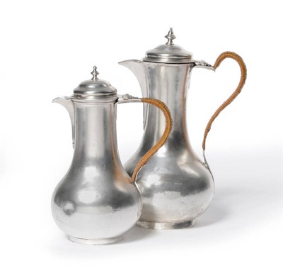 Lot 545 - A George III Hot Water Jug, Ayme Videau, London 1761, of plain baluster form with wickered loop...