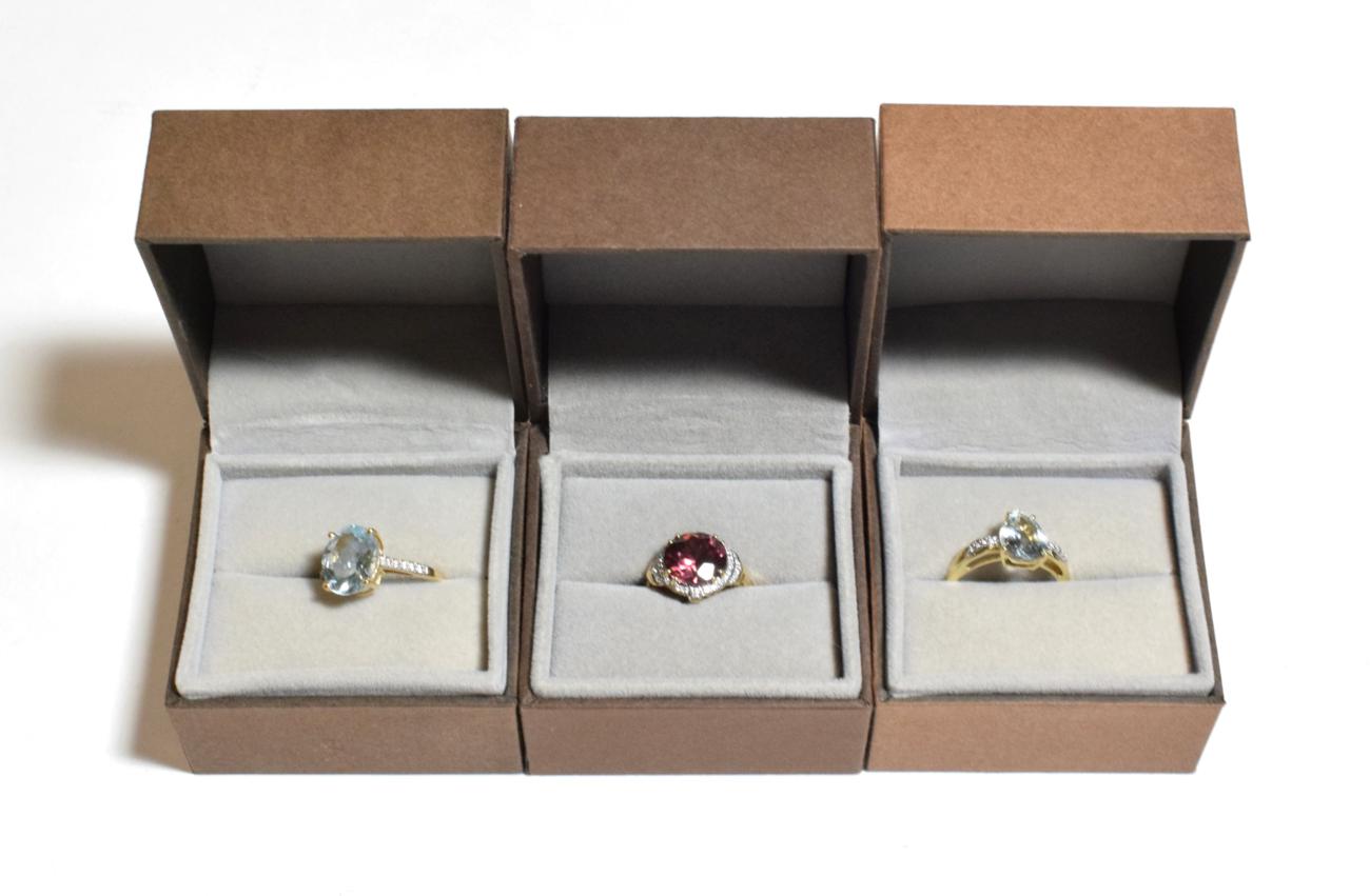Lot 244 - A 9 carat gold aquamarine and diamond ring, finger size P1/2; an aquamarine and diamond ring,...