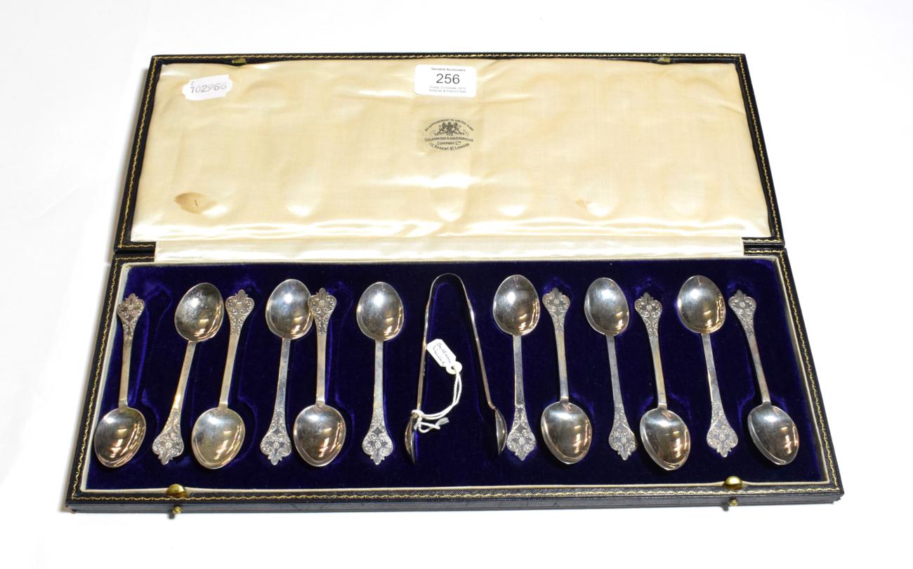 Lot 256 - A cased set of twelve silver teaspoons with tongs, Goldsmiths and SIlversmiths Co., Britannia...