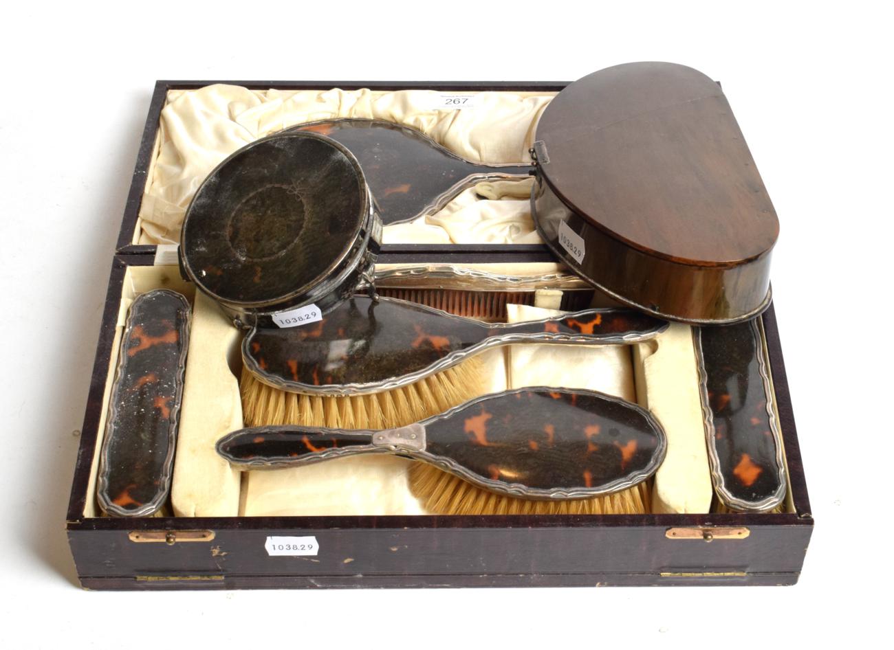 Lot 267 - A George V six-piece silver-mounted tortoiseshell dressing-table set, by The Northern...