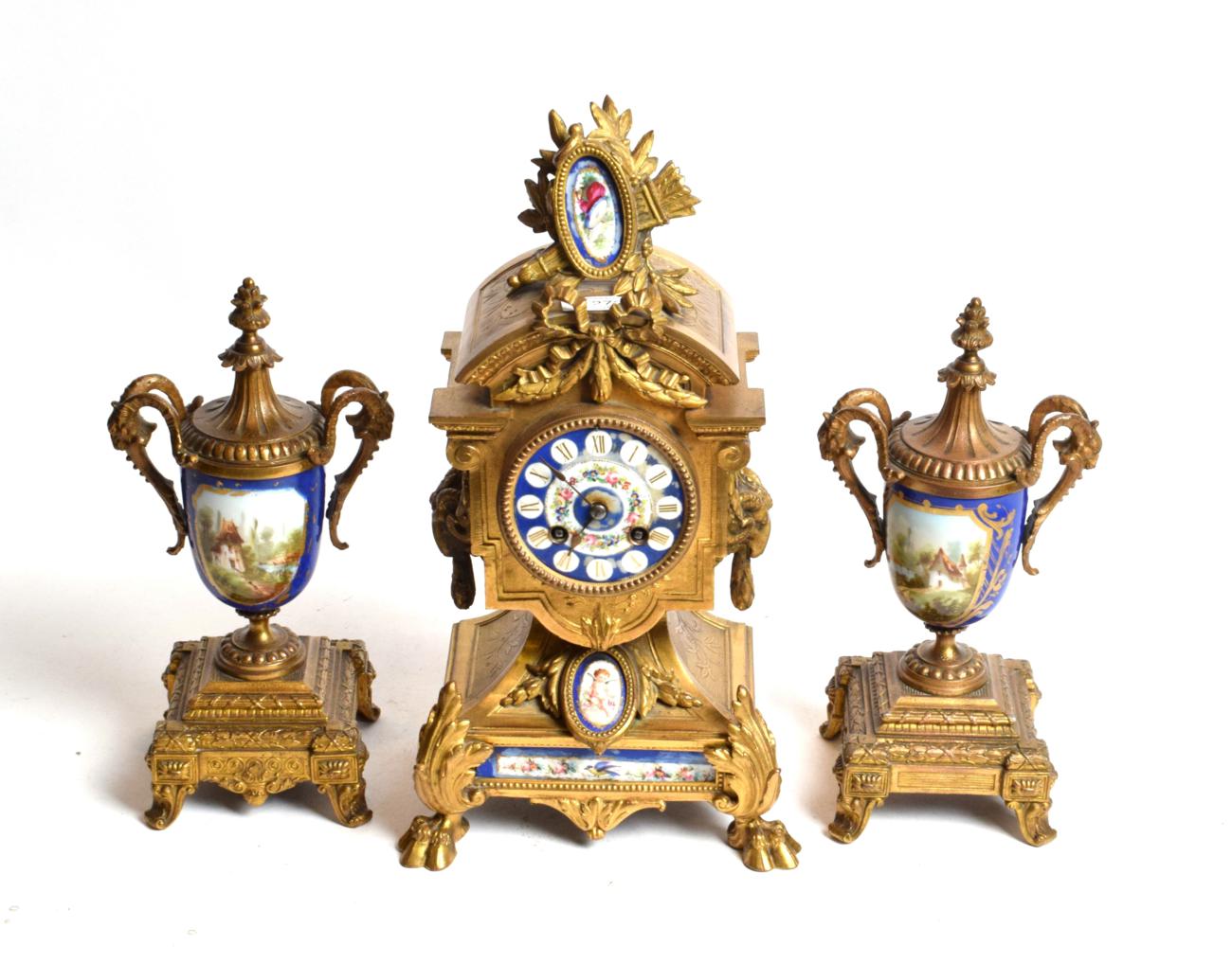 Lot 272 - A 19th century French gilt-metal and porcelain clock garniture (3)