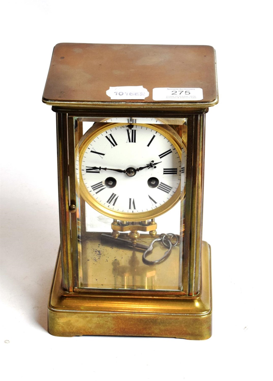 Lot 275 - A brass four glass striking mantle clock, circa 1900