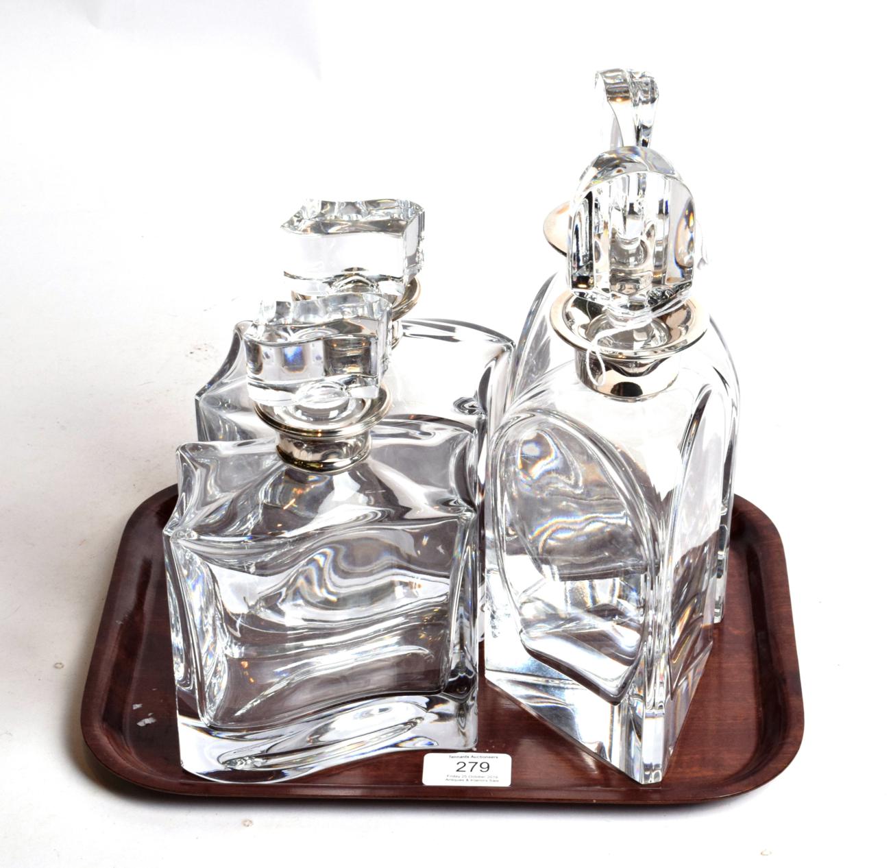 Lot 279 - A pair of Elizabeth II silver-mounted Bohemian glass decanters, the mounts by Laurence R....