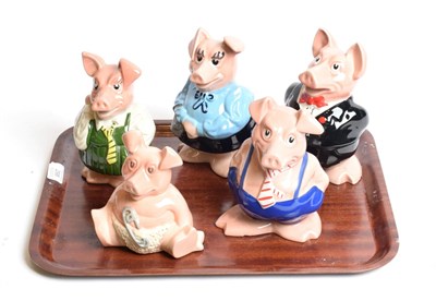 Lot 298 - A set of five Wade Natwest pig money banks