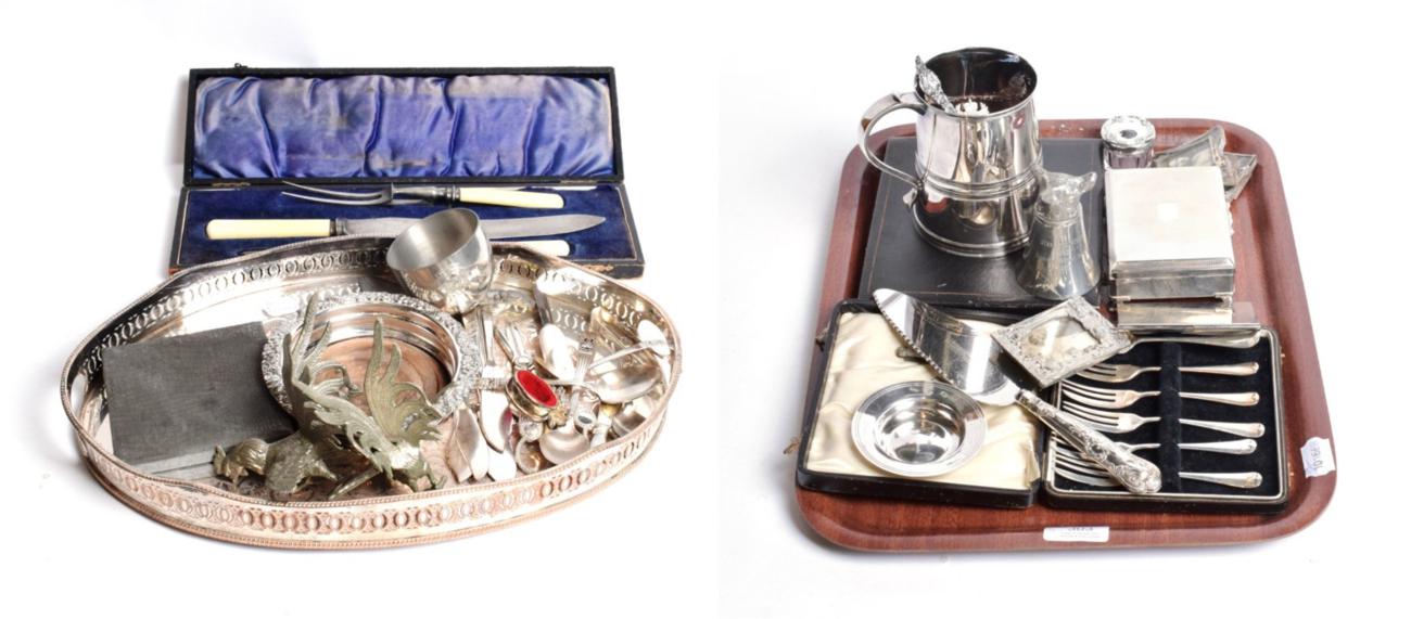 Lot 303 - A small group of silver including a pin dish; trophy; cake forks; small photograph frames; and...
