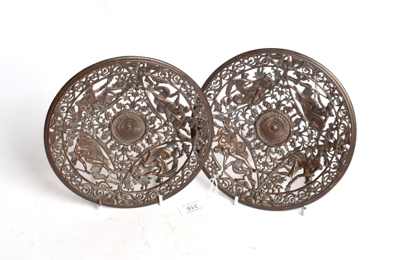 Lot 316 - A pair of Coalbrookdale cast iron dishes, 20cm diameter; and a George IV silhouette, dated 1828 (3)
