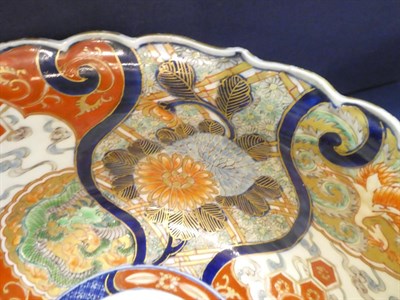 Lot 325 - A Japanese Imari bowl, Meiji period, typically painted with dragons and foliage