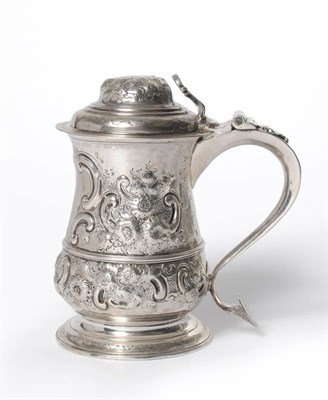 Lot 556 - A George II Tankard, Benjamin Cartwright I, London 1752, of girdled baluster form with scroll...