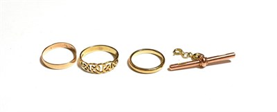 Lot 348 - Two 9 carat gold band rings, finger sizes J and M1/2; another 9 carat gold ring, finger size P; and