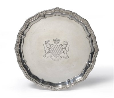 Lot 563 - A George III Salver, William & Robert Peaston, London 1758, shaped circular with gadrooned rim...