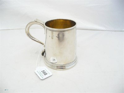 Lot 568 - A George I Mug, Timothy Ley, London 1722, the tapering cylindrical body with moulded borders...