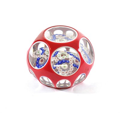 Lot 9 - A Baccarat Red and White Double Overlay Millefiori Paperweight, circa 1850, with central...