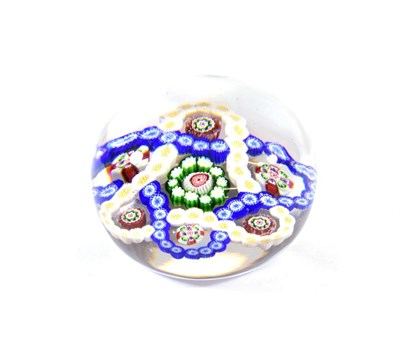 Lot 13 - A Baccarat Double Trefoil Paperweight, circa 1850, with blue, white and yellow interlaced...