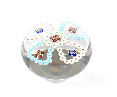 Lot 14 - A Baccarat Patterned Millefiori Paperweight, circa 1850, with central canes within four pale...
