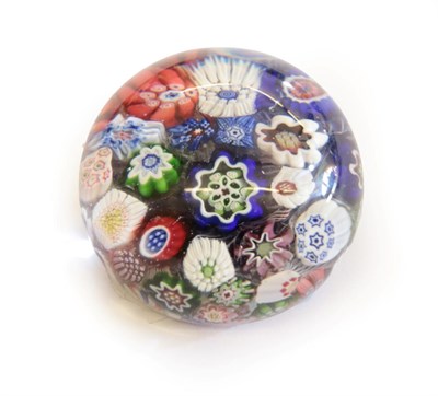 Lot 23 - A Baccarat Miniature Millefiori Paperweight, circa 1850, set with various coloured canes, 4cm...