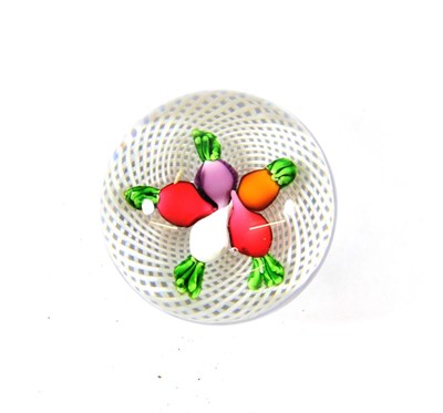 Lot 28 - A St Louis Vegetable Paperweight, circa 1850, set with five multi-coloured turnips on a spiral...