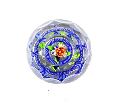 Lot 30 - A St Louis Faceted Upright Bouquet Paperweight, circa 1850, set with a red, white and blue posy...