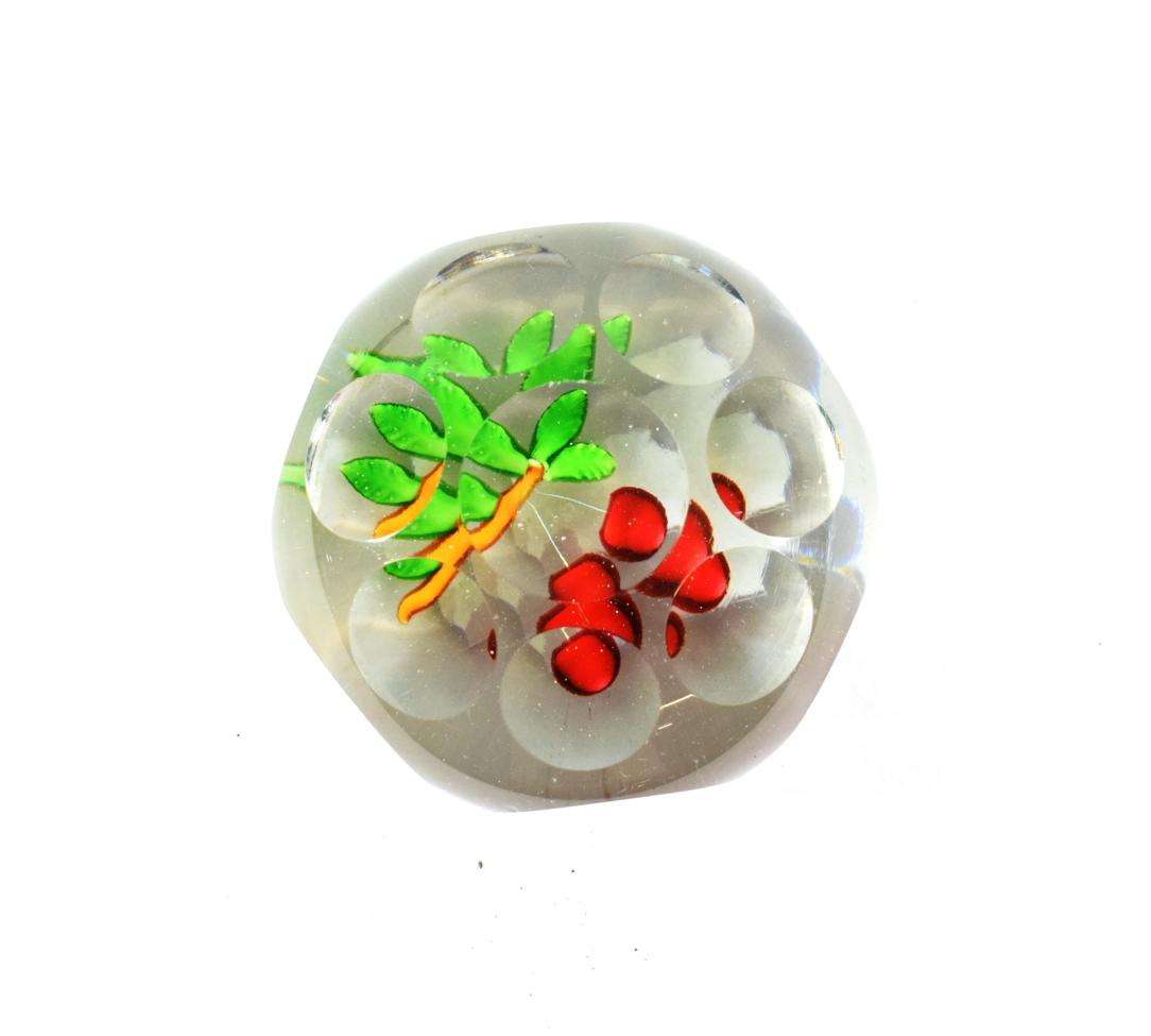 Lot 34 - A St Louis Faceted Cherries Paperweight, circa 1850, set with a leaf branch hung with two cherries