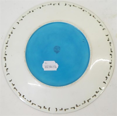 Lot 39 - A Pair of Minton Plates, circa 1870, decorated with birds amongst branches on a sky blue ground...
