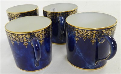 Lot 48 - A Set of Four Sèvres Porcelain Coffee Cans and Saucers, 19th century, gilt with foliate and...