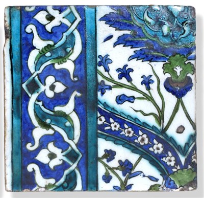 Lot 53 - A Damascus Pottery Border Tile, circa 1580, from the same series, with scroll and strapwork border