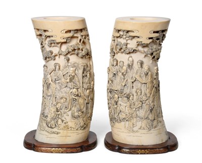 Lot 66 - A Pair of Japanese Ivory Tusk Vases, Meiji period, each deeply carved and pierced with...