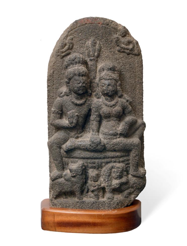 Lot 67 - An Indian Schist Altar Carving, probably Uttarakhand, 9th or 10th century, as Shiva and Pavarti...