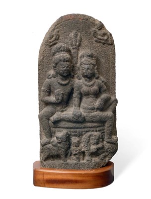 Lot 67 - An Indian Schist Altar Carving, probably Uttarakhand, 9th or 10th century, as Shiva and Pavarti...