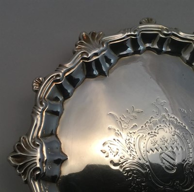 Lot 77 - A George II Silver Waiter, by William Peaston, London, 1751, shaped circular and on three pad feet