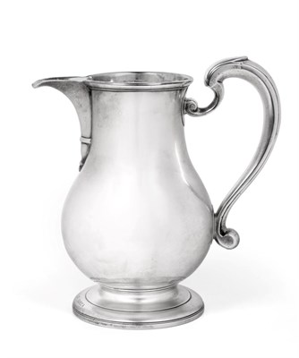 Lot 79 - A George II Silver Beer-Jug, by Richard Bayley, London, 1736, pear-shaped and on spreading...