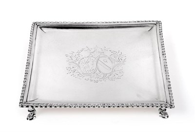 Lot 80 - A George II Silver Waiter, by Richard Rugg, London, 1765, square and with gadrooned border, on four